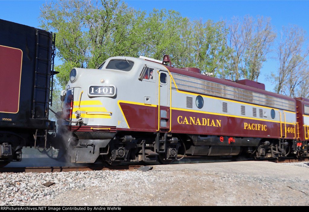 CP 1401 along for the ride with 2816, as well as sister 4107 behind